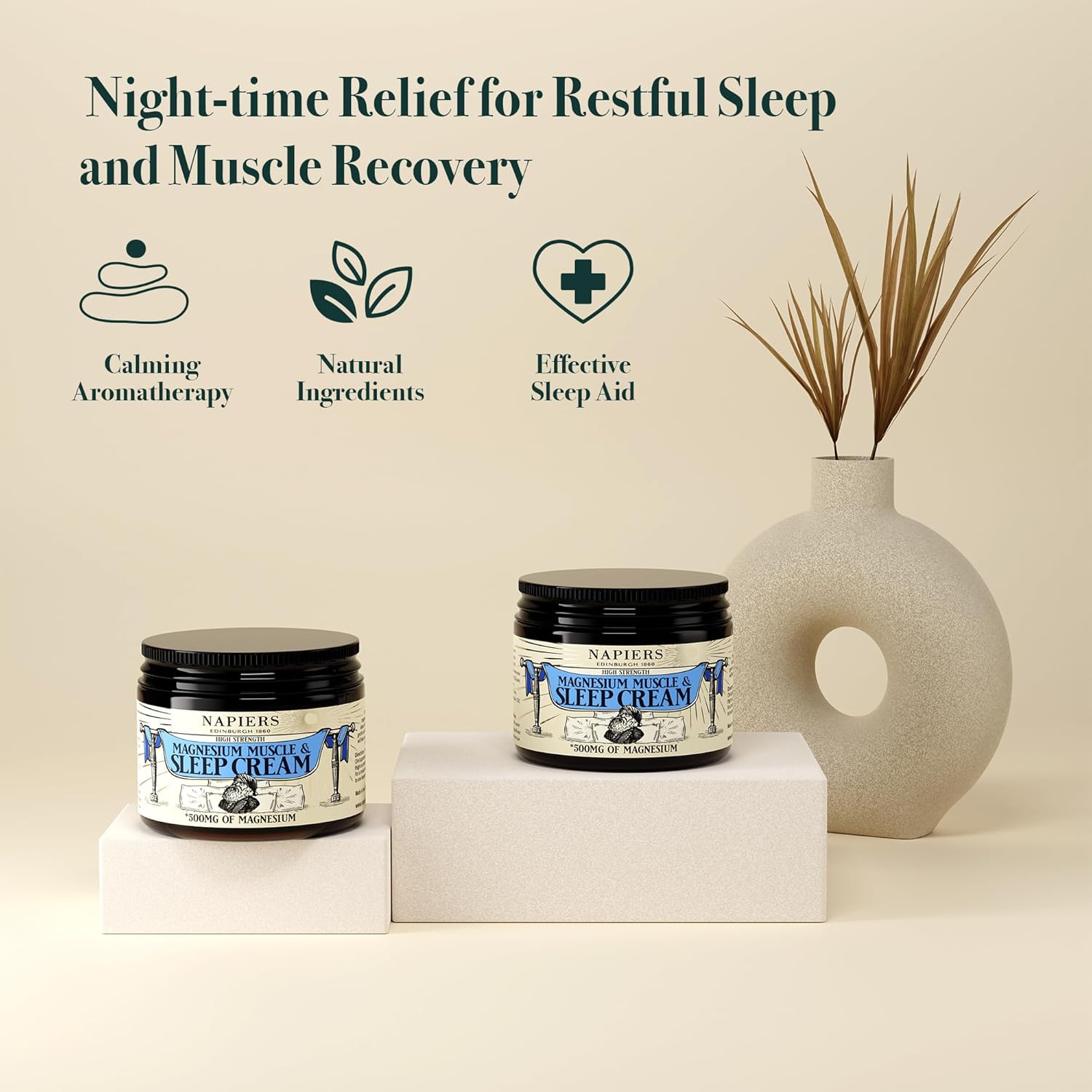 Two jars of Napiers Magnesium Muscle & Sleep Cream displayed with calming aromatherapy and natural ingredient icons