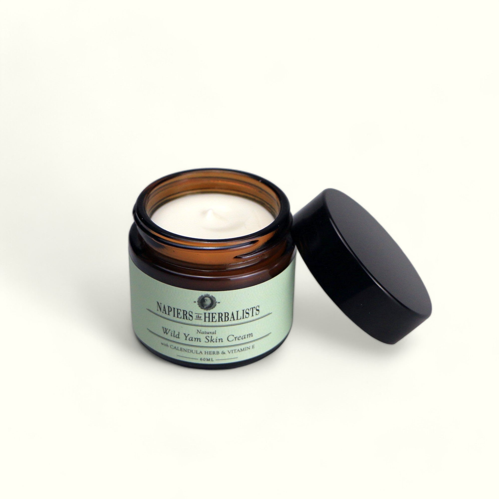Opened Napiers Wild Yam Skin Cream jar with lid removed revealing creamy texture inside