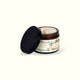 Open Napiers Arnica Plus Emergency Skin Cream revealing creamy texture with black screw-top lid