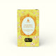 Napiers Chamomile Flower Tea 100g box with bright yellow packaging, ornate gold frame, and loose chamomile flowers visible through window