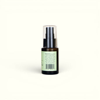 Napiers Eyebright Cream in dark glass bottle with pale green label and black pump dispenser, back view showing ingredients