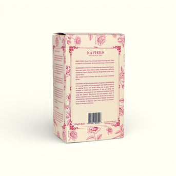 Back of Napiers Rosy Calm Tea box showing ingredients, directions, cautions, and product information on cream label with pink rose design.