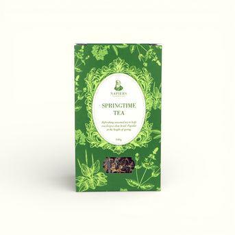Napiers Springtime Herbal Tea Blend 100g box with green packaging, ornate frame label, and loose herb window display