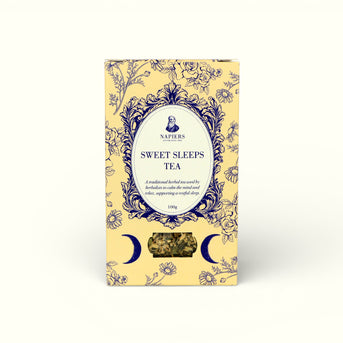 Napiers Sweet Sleeps Tea 100g loose herbal tea in yellow packaging with navy floral design and visible herbs through window