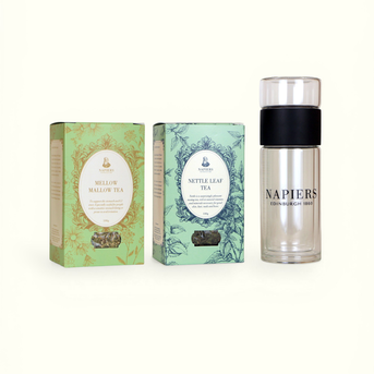 Napiers Herbal Tea Ritual Set with double-walled glass infuser flask, Mellow Mallow tea box, and Nettle Leaf Tea box displayed together