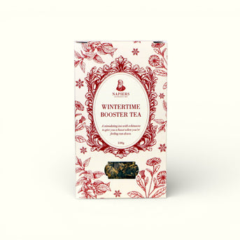 Napiers Wintertime Booster Tea front packaging with red botanical design and 100g loose leaf tea visible through window