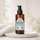 Napiers Rowan Brightening Cleanser on ceramic dish with white towel and white flowers in styling